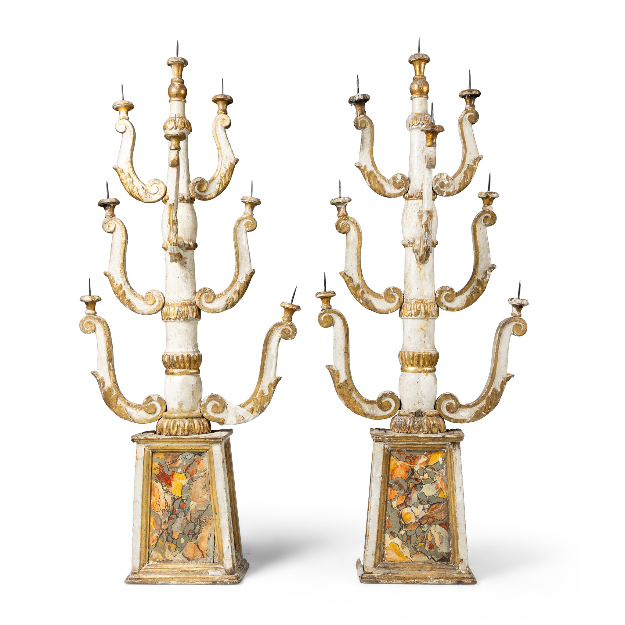 A PAIR OF WHITE PAINTED AND GILT WOOD PRICKET CANDLESTANDS