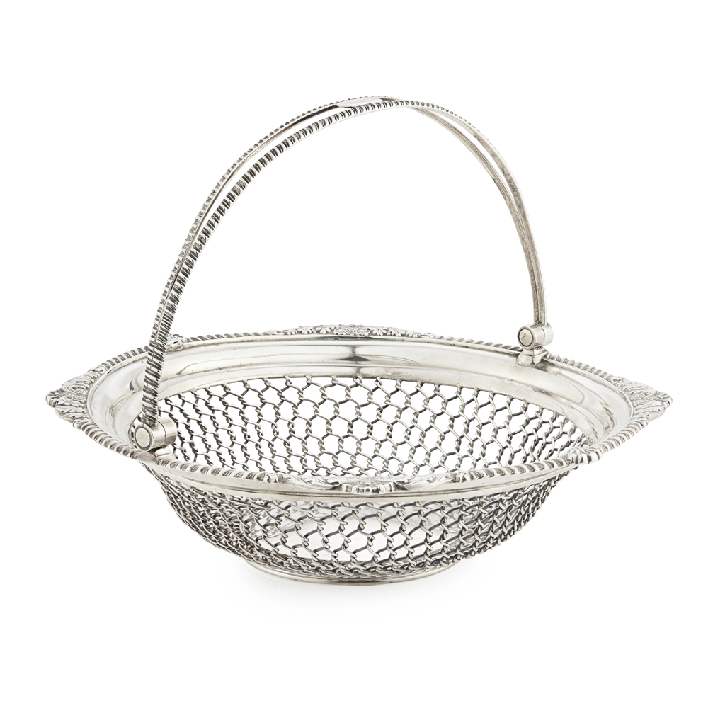An unusual George III swing handled basket