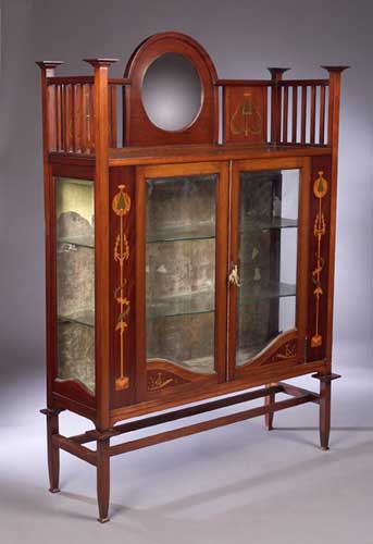 An Art Nouveau mahogany and marquetry inlaid display cabinet