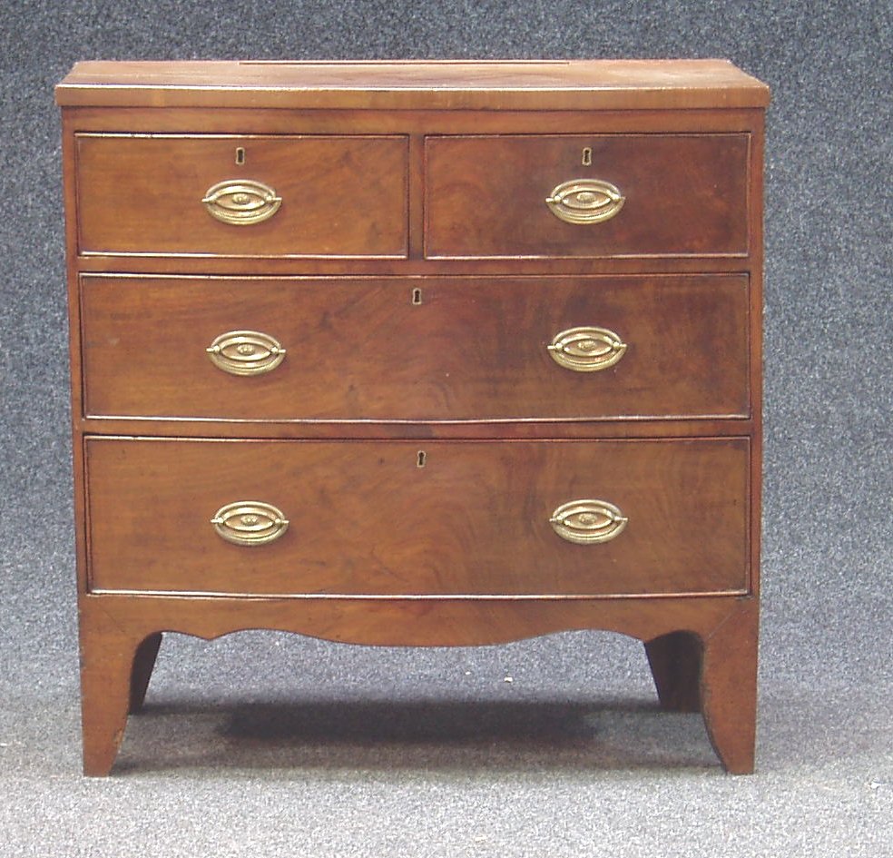 A bowfront mahogany chest,