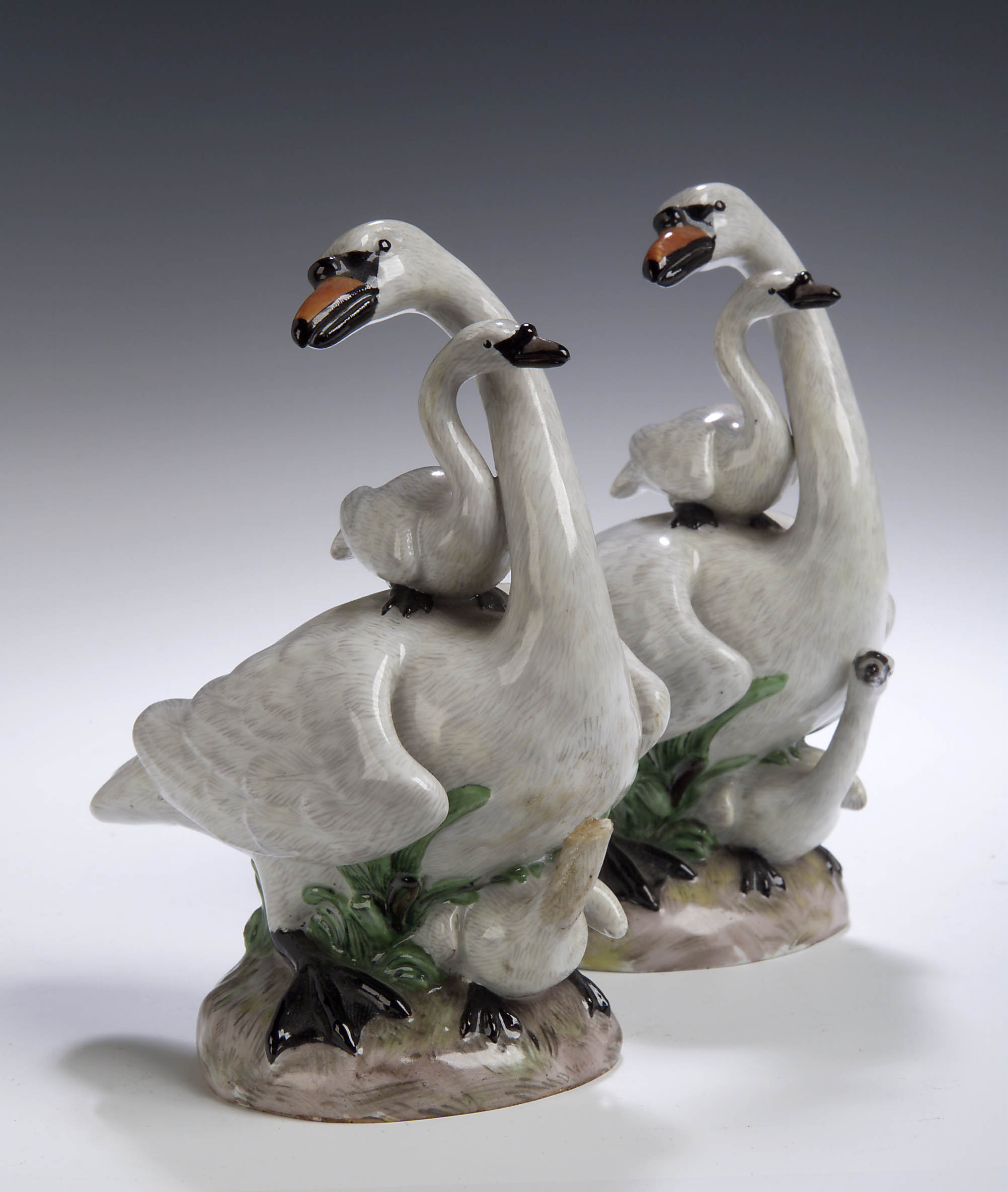 A matched pair of 19th century Meissen figures of swans