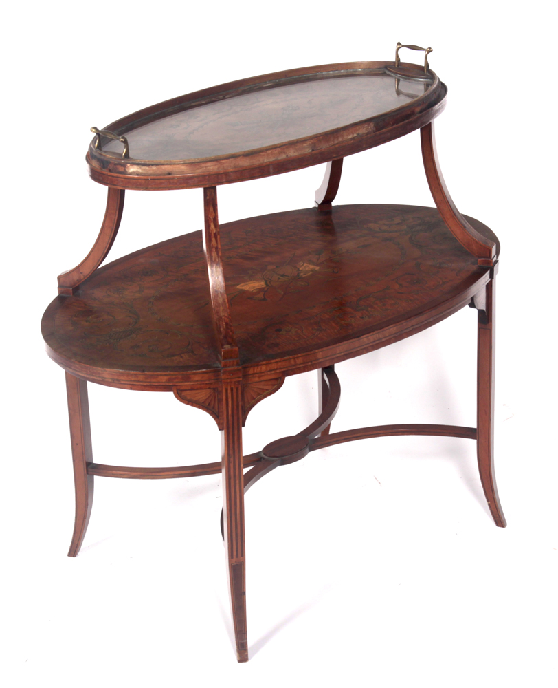 An Edwardian satinwood and inlaid étagère