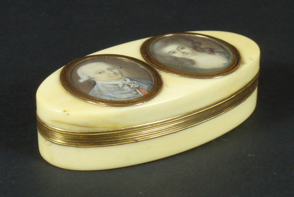 A late 18th century gold and ivory box inset with miniatures of Peregrine, Duke of Ancaster and Kestevin and his wife, c 1760.(See line 221)
