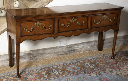 An 18th century oak dresser base