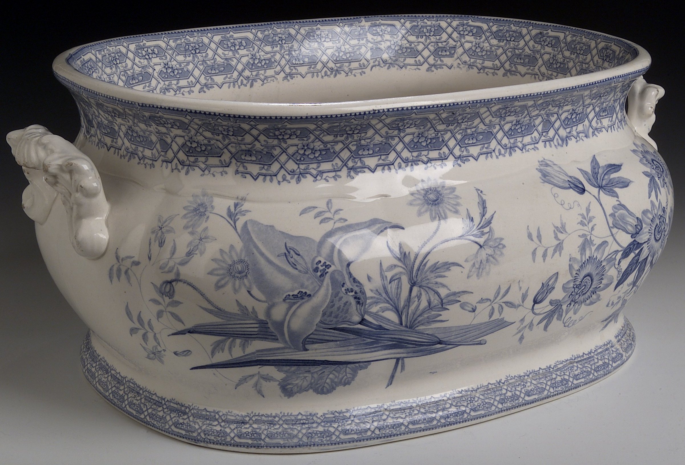 A Mintons blue printed ironstone type 'Trellis and Plants' pattern footbath