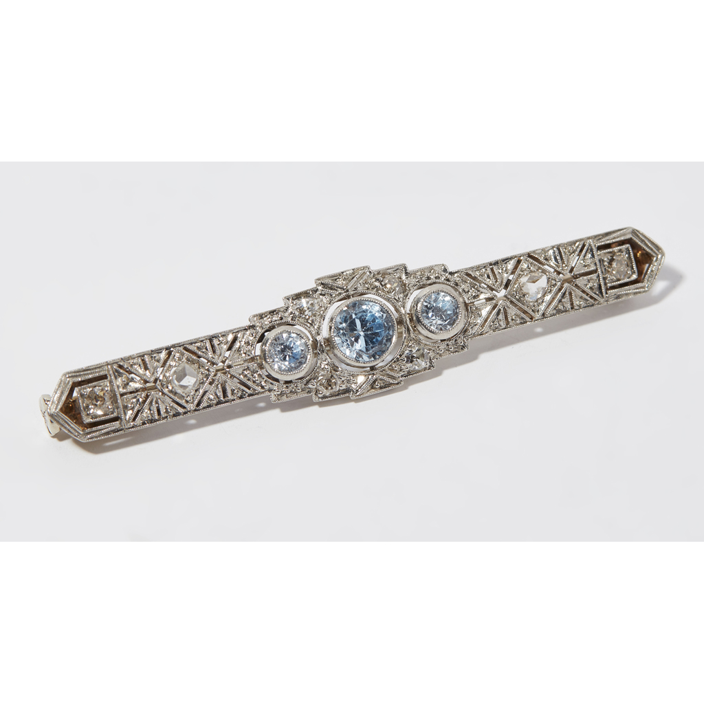 An aquamarine and diamond set brooch