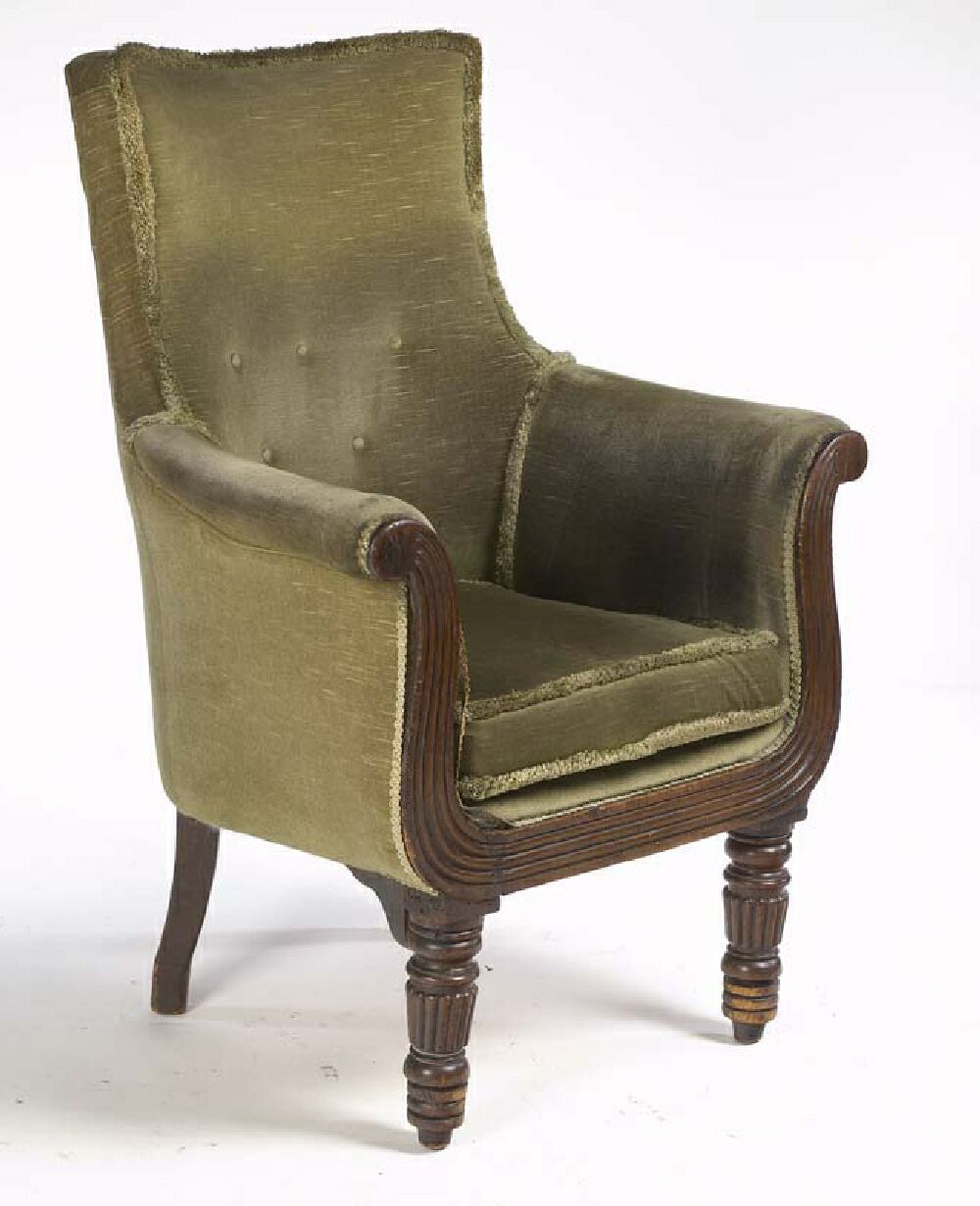 A pair of William IV period mahogany framed library bergeres