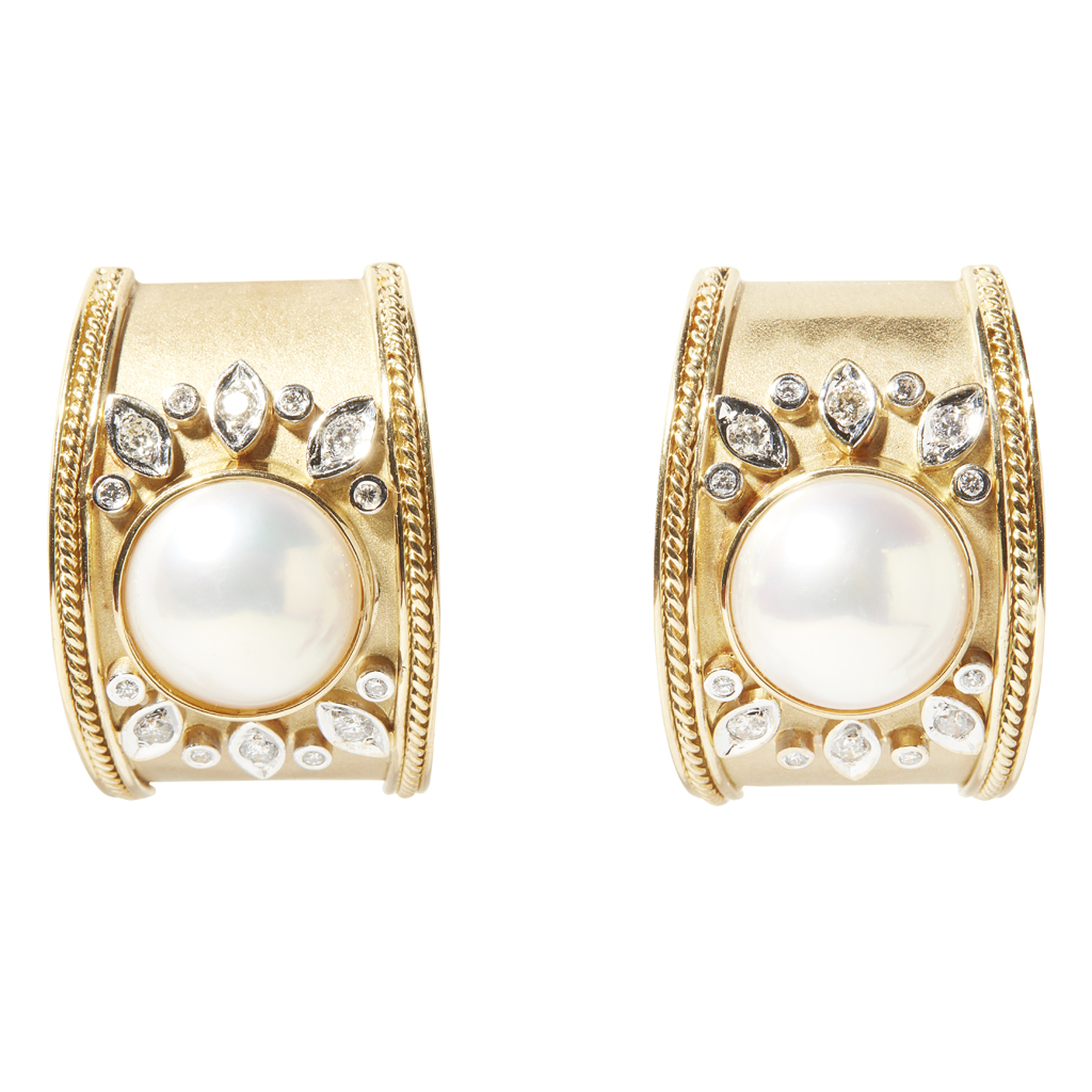 A pair of 1980s pearl and diamond set earrings