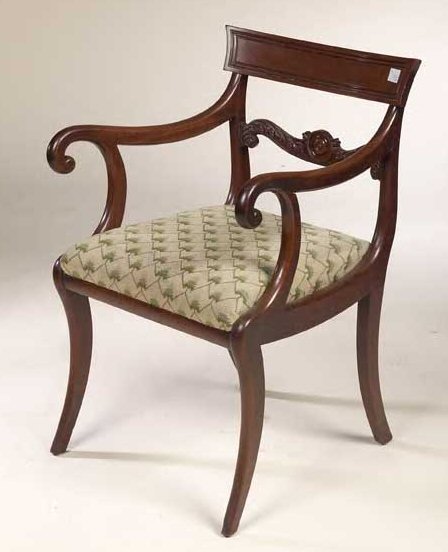 A Regency mahogany carver,