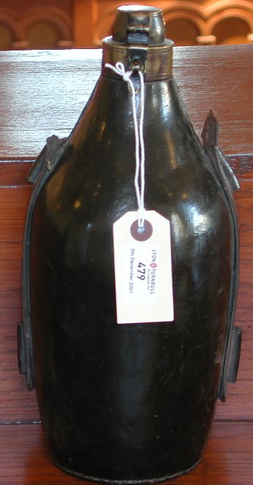 A late 18th century leather gunpowder magazine