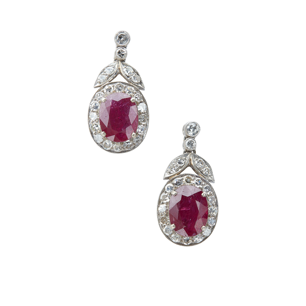A pair of ruby and diamond set pendant earrings
