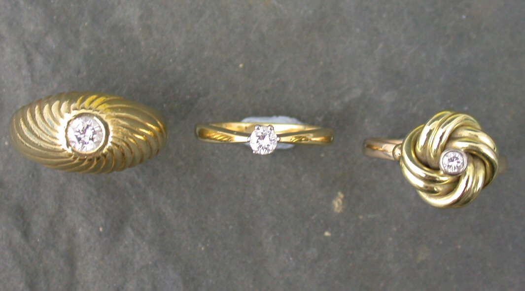 An 18ct gold mounted diamond single stone ring,