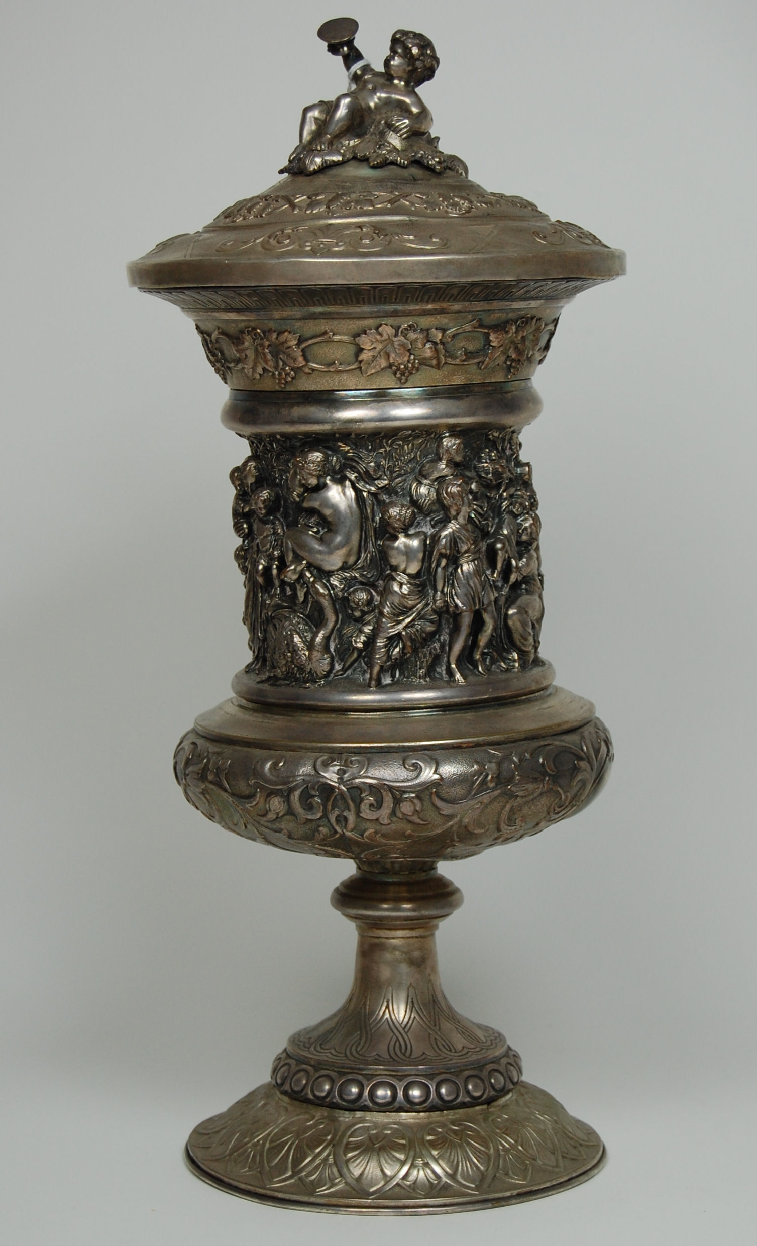 A silver plated cup and cover