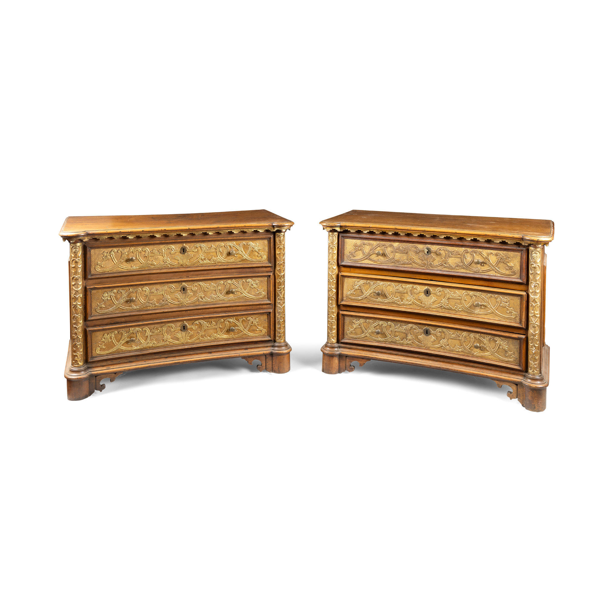 A PAIR OF CONTINENTAL BEECH AND GILT DECORATED COMMODES