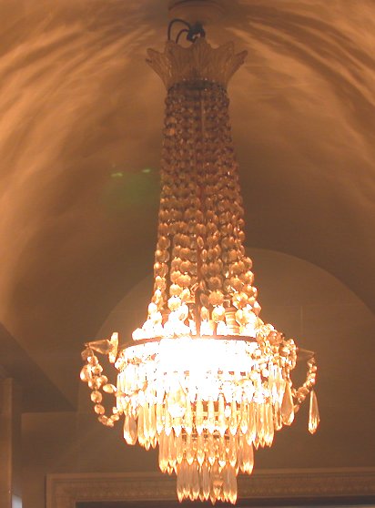 A four tier cut glass chandelier
