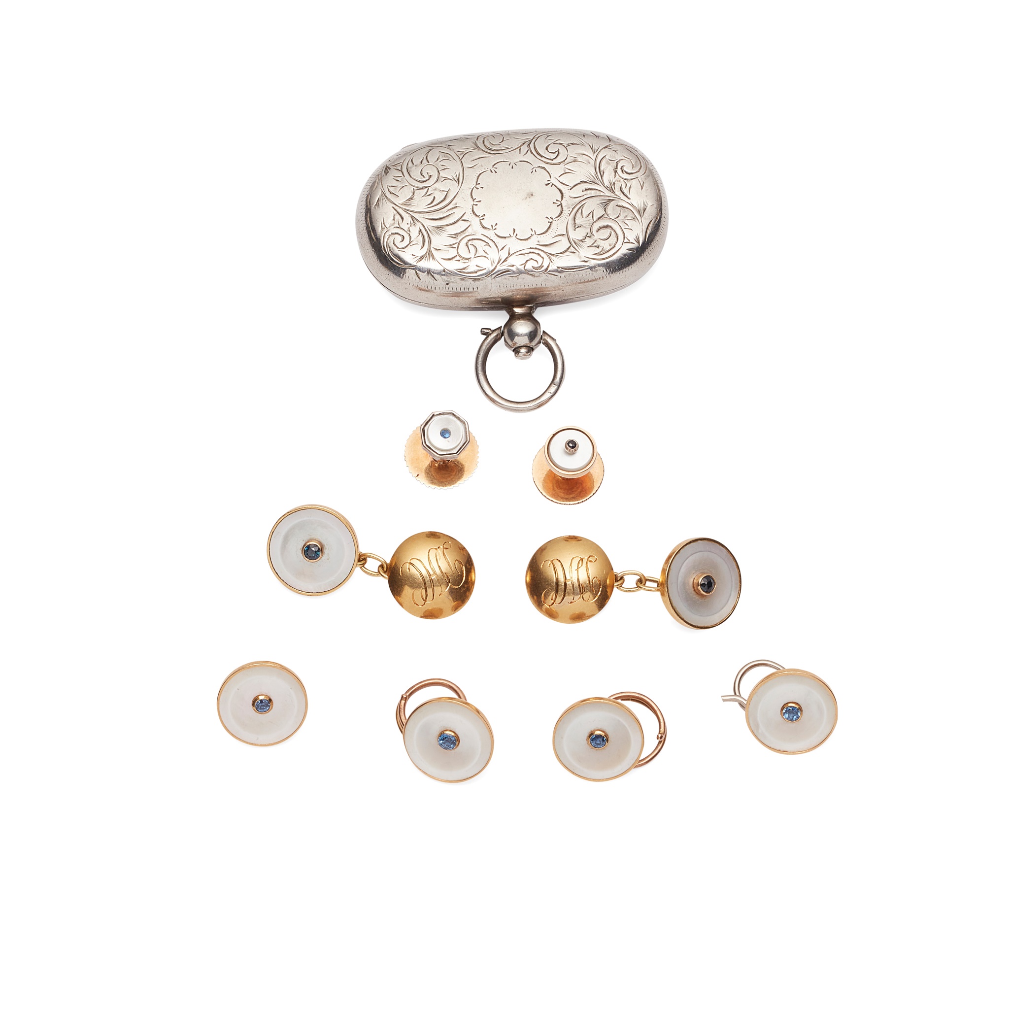 A mother of pearl and sapphire set gentleman’s dress set