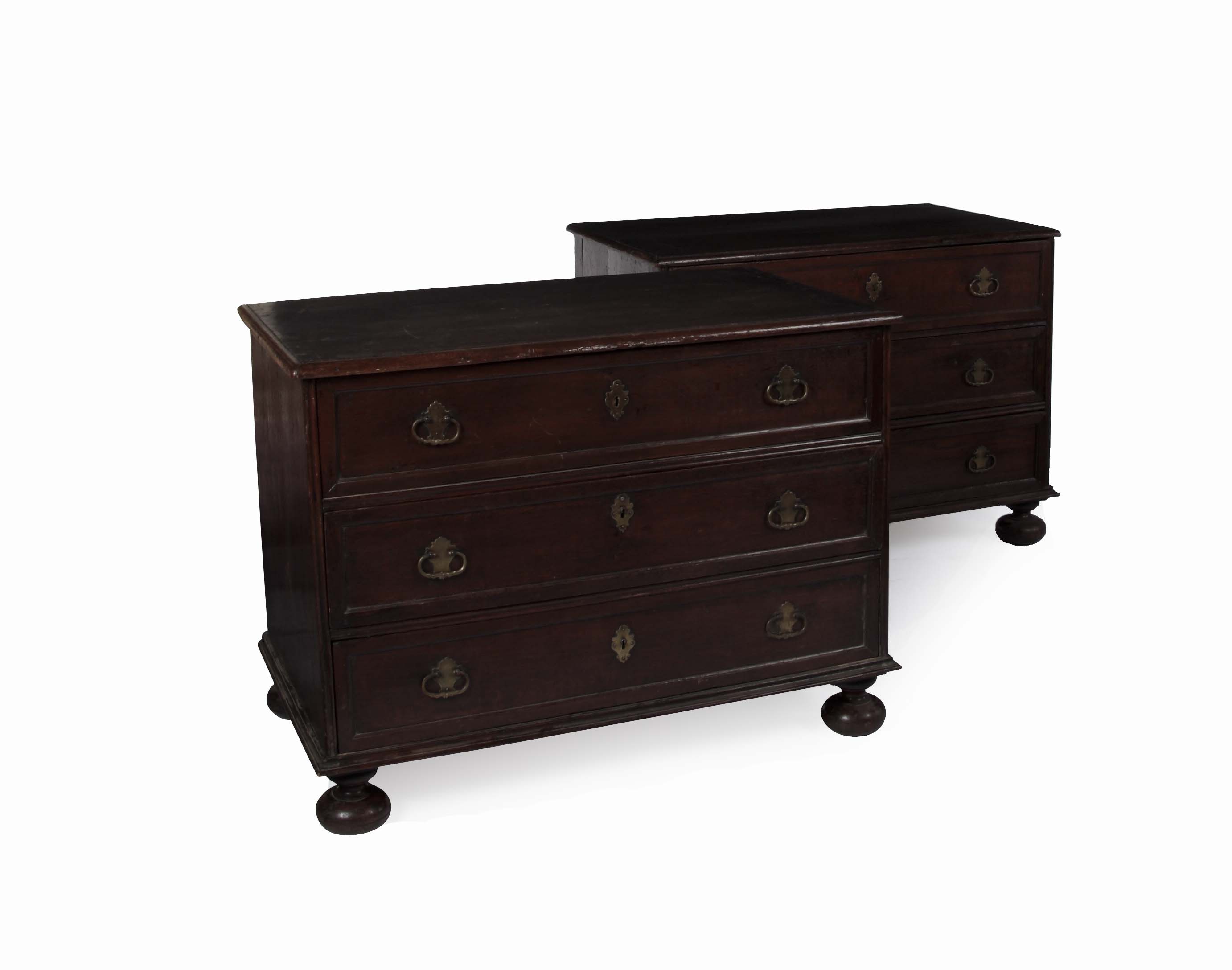 A pair of 18th century French provincial oak commodes