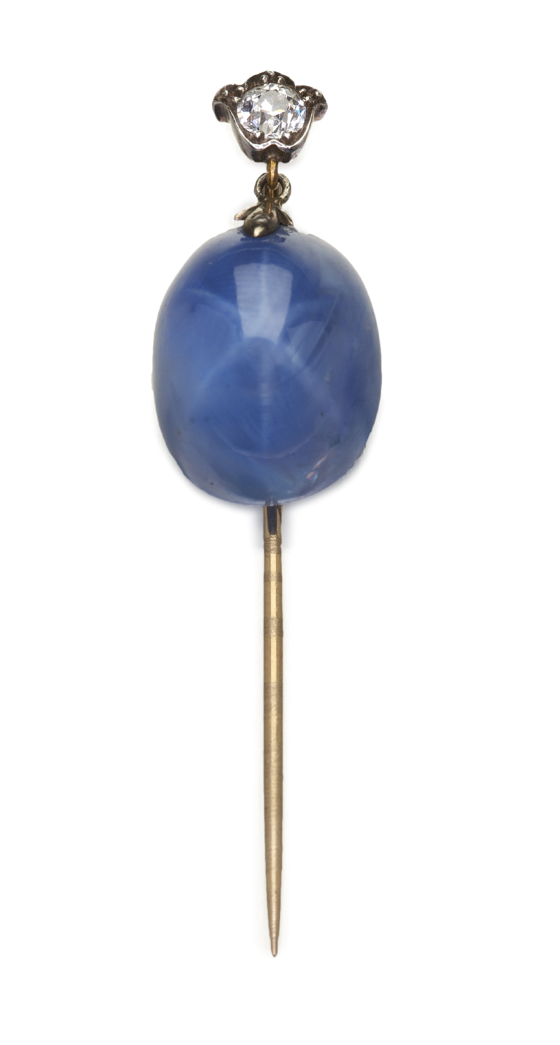 A star sapphire and diamond set stickpin