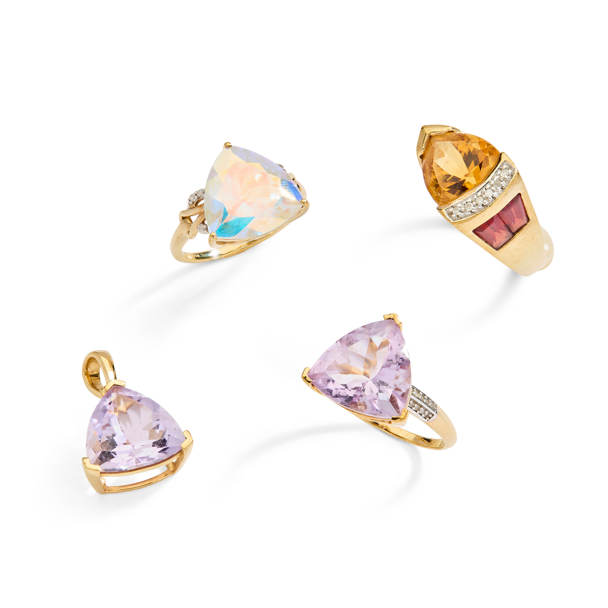 A 9ct gold rose quartz and diamond dress ring and three others