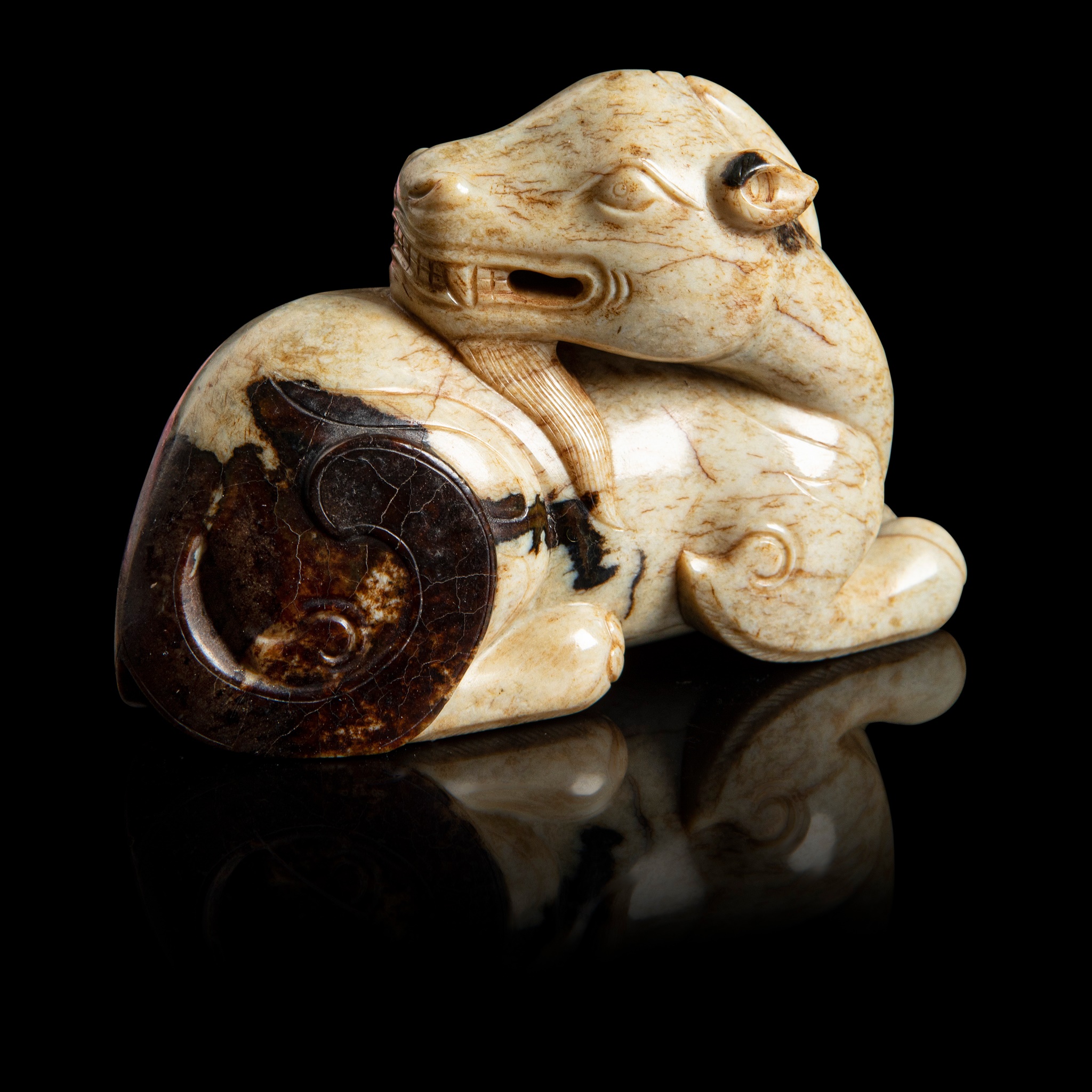 'CHICKEN BONE' JADE CARVING OF A GOAT