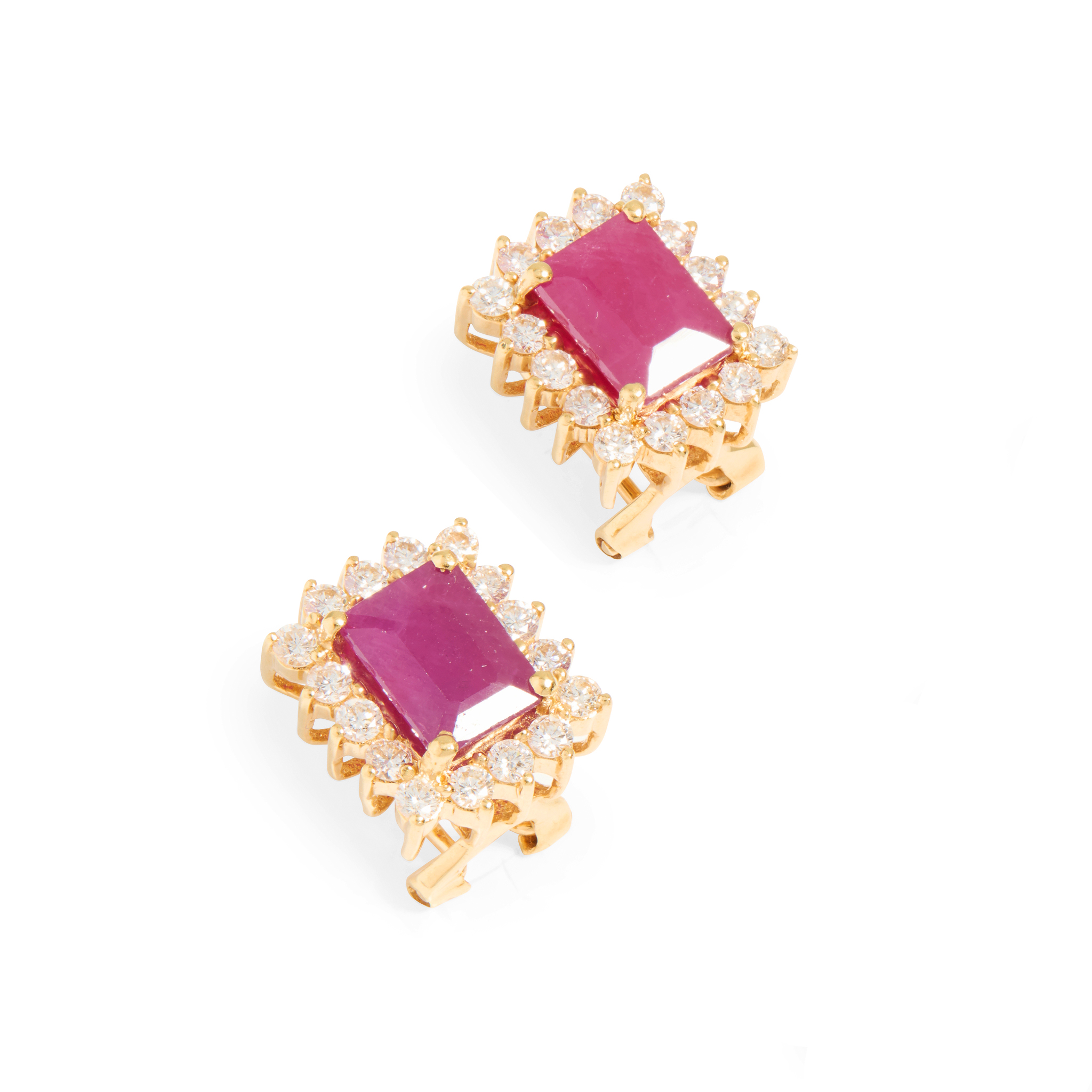 A pair of ruby and diamond cluster earrings