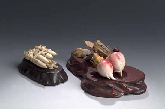A joined pair of Japanese carved ivory swedes