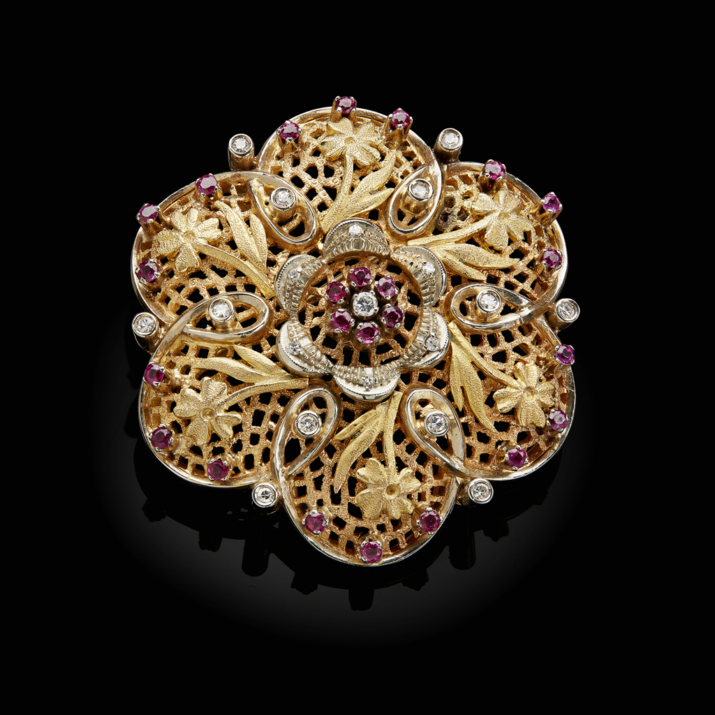 A ruby and diamond set brooch