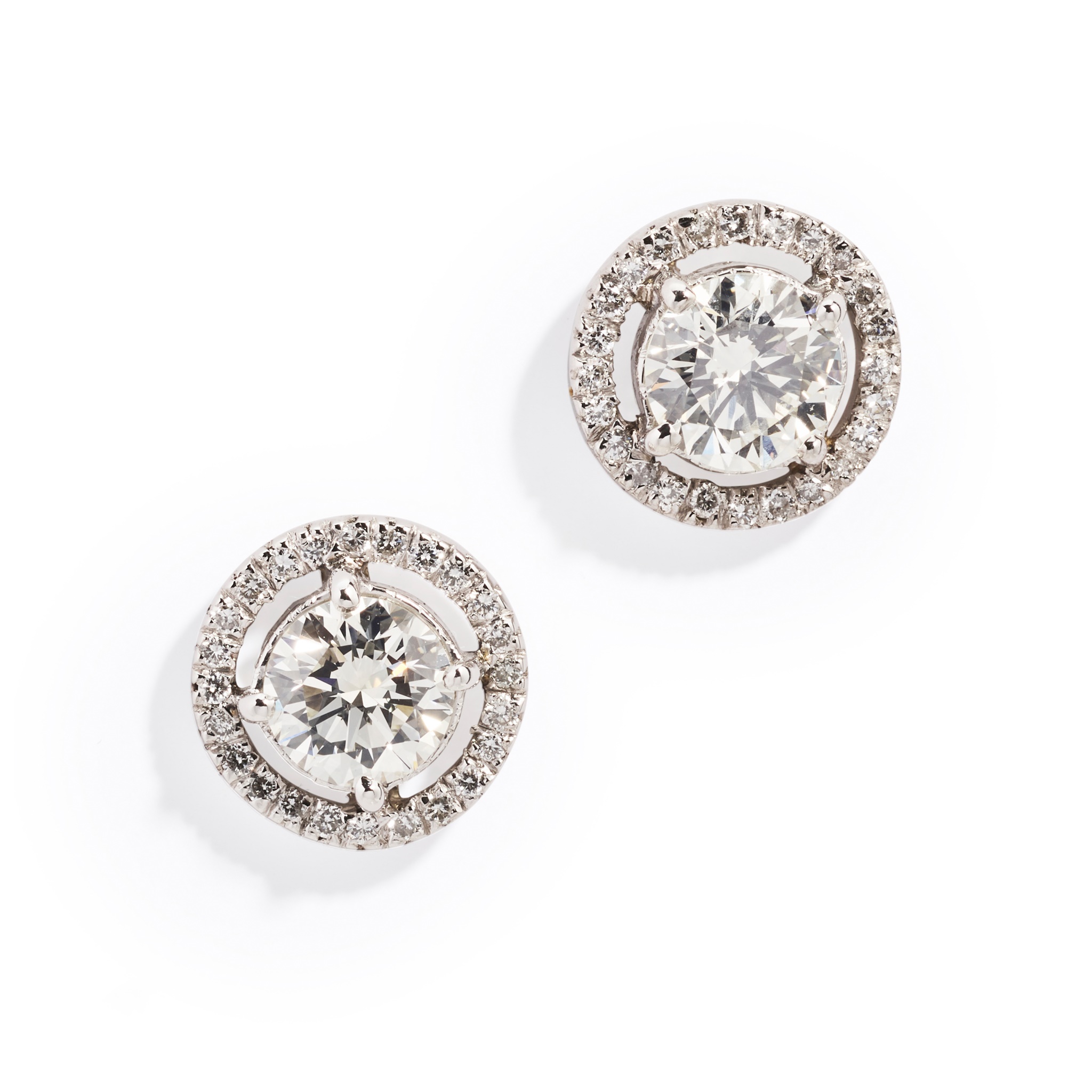 A pair of diamond cluster earrings