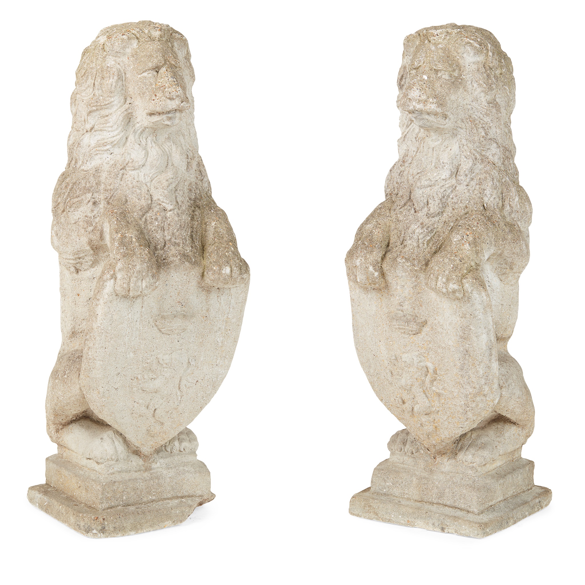 PAIR OF COMPOSITION STONE ARMORIAL LIONS