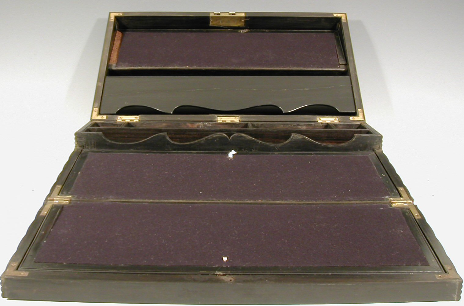 A 19th century ebony writing slope,