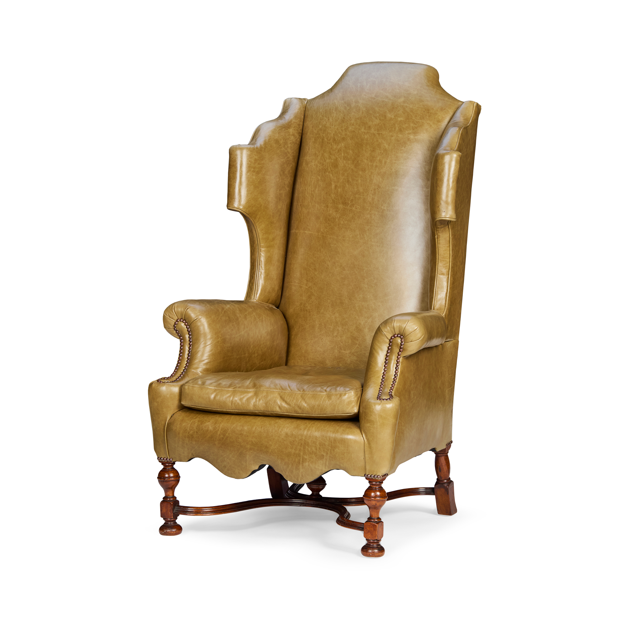 GEORGE II STYLE MAHOGANY AND LEATHER UPHOLSTERED WING ARMCHAIR