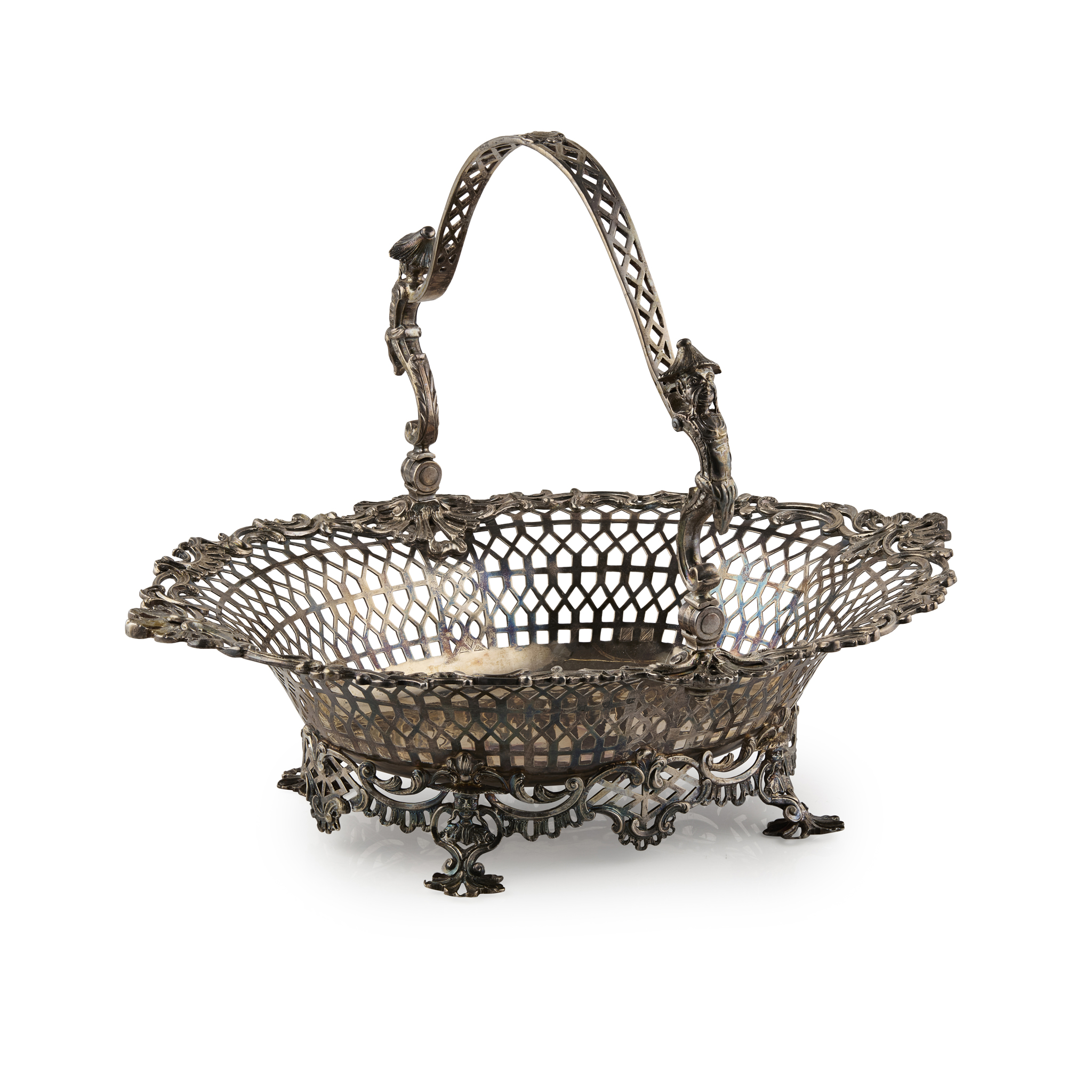 A GEORGE II SWING-HANDLED CAKE BASKET