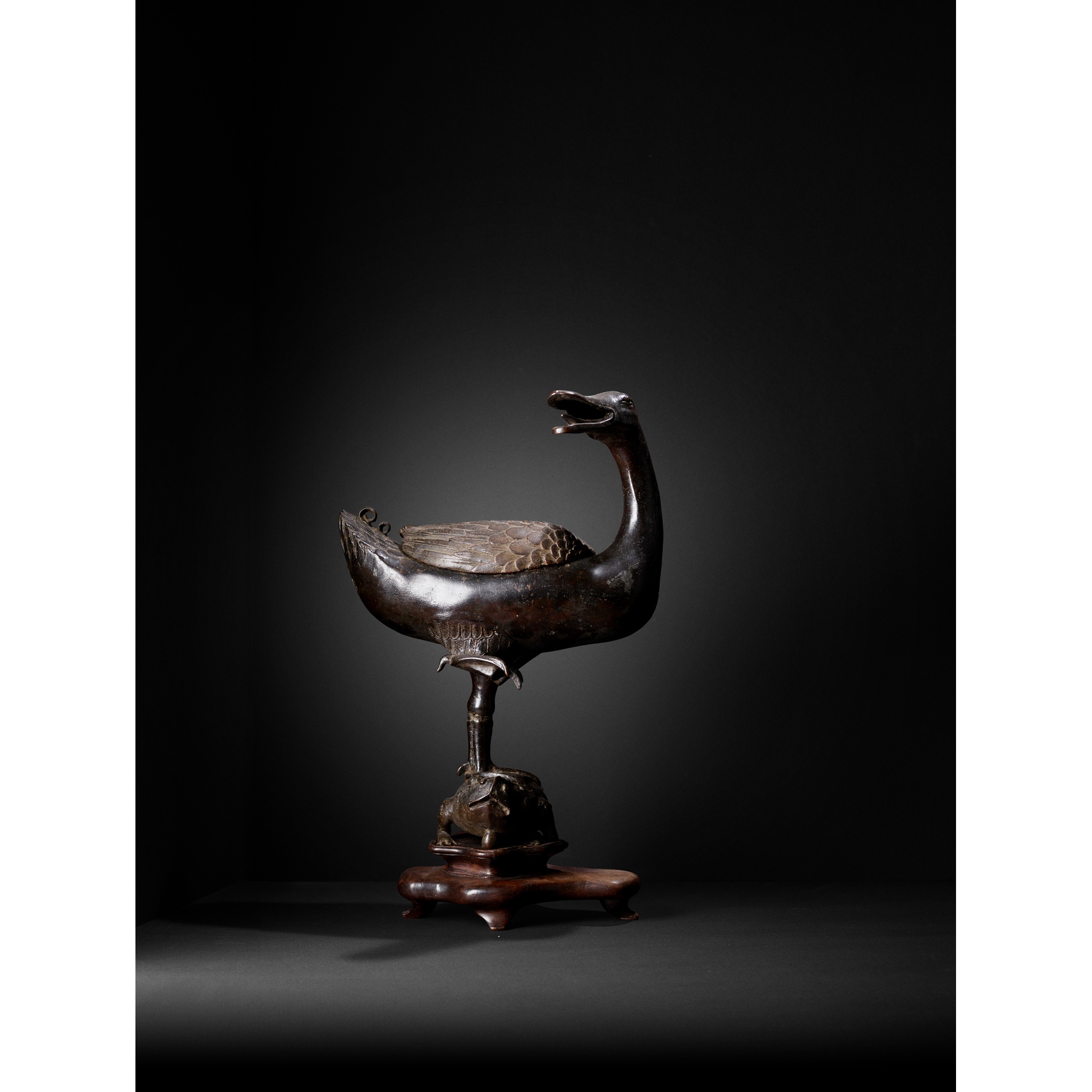 RARE BRONZE INCENSE BURNER IN THE FORM OF A DUCK STANDING ON TOAD