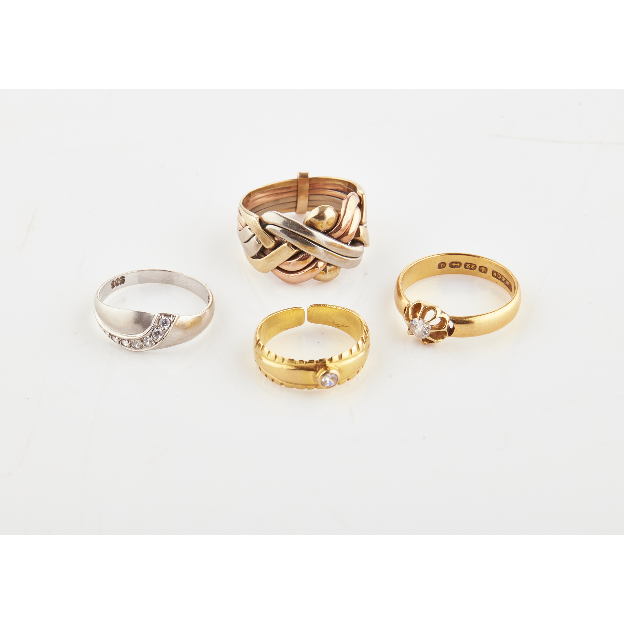 A gentleman's 9ct three colour gold puzzle ring