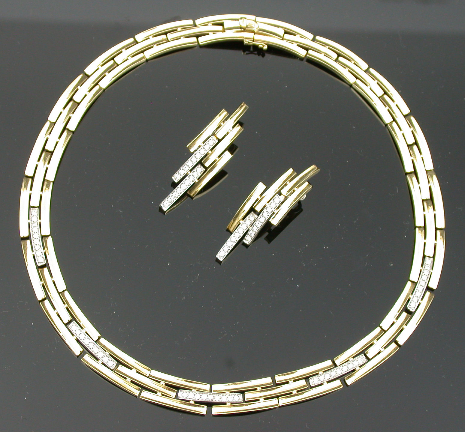 An Italian gold and diamond suite,