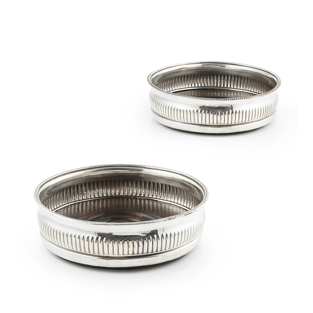 A PAIR OF GEORGE IV WINE COASTERS