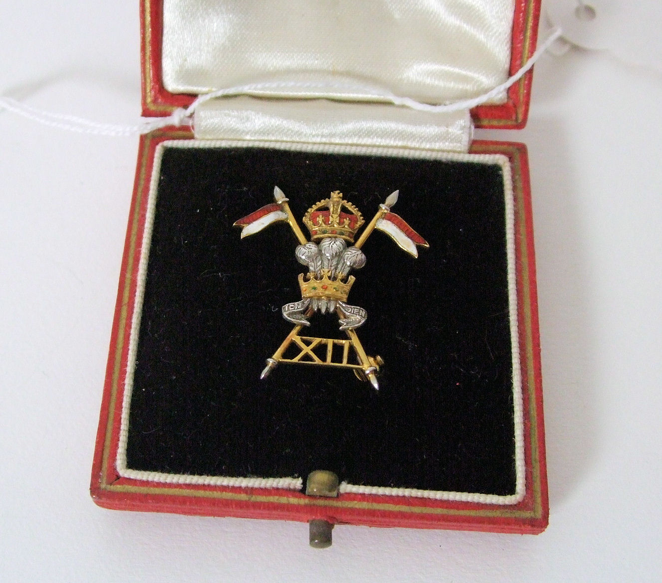 Gold enamel regimental brooch