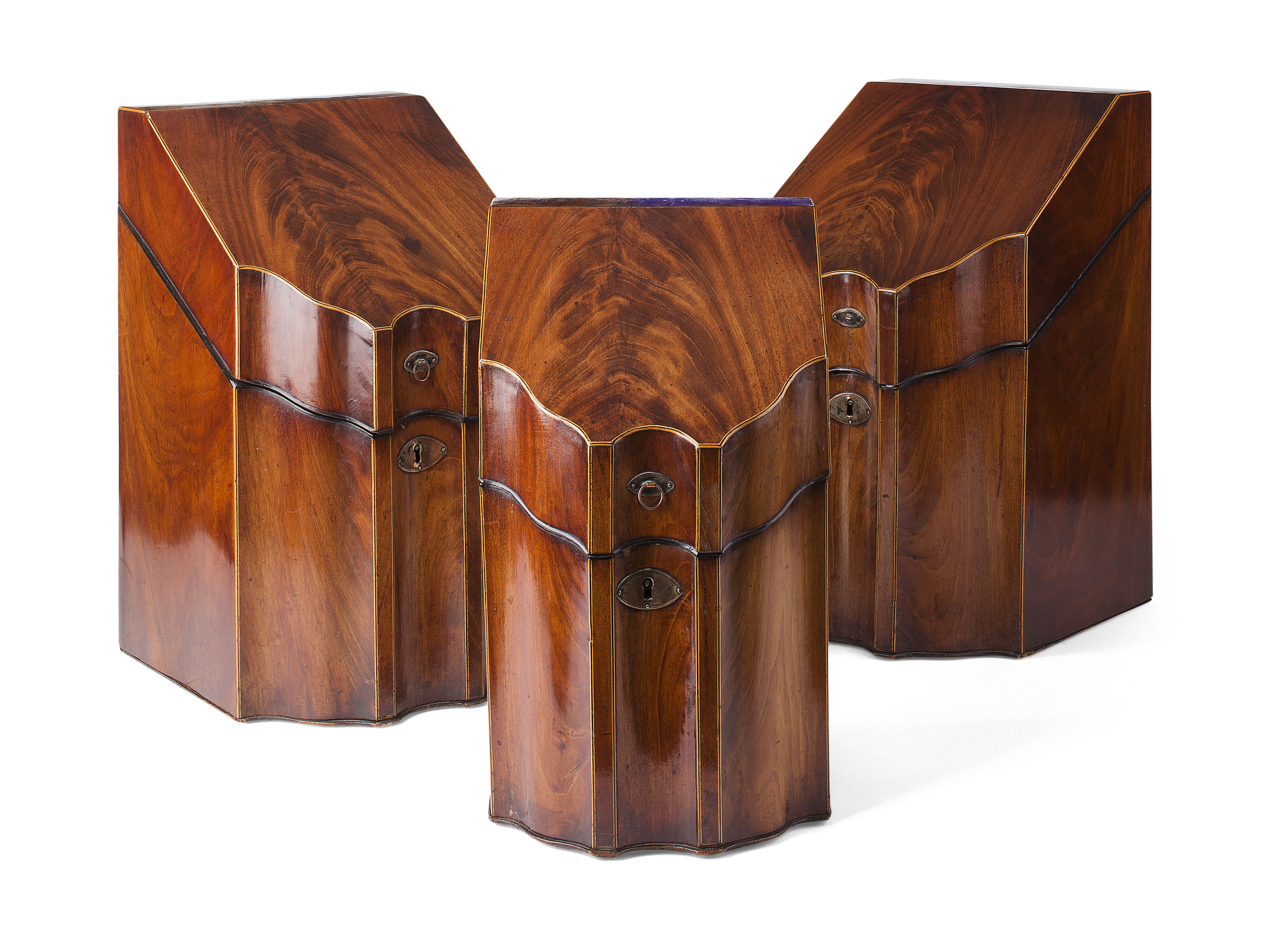GROUP OF THREE GEORGE III MAHOGANY SERPENTINE KNIFE BOXES