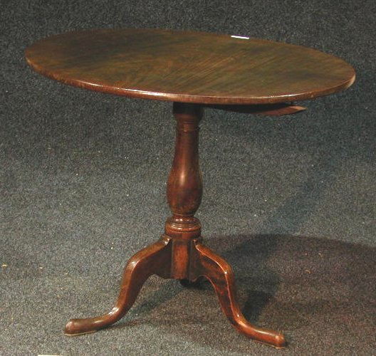 A George III mahogany snap top table,
