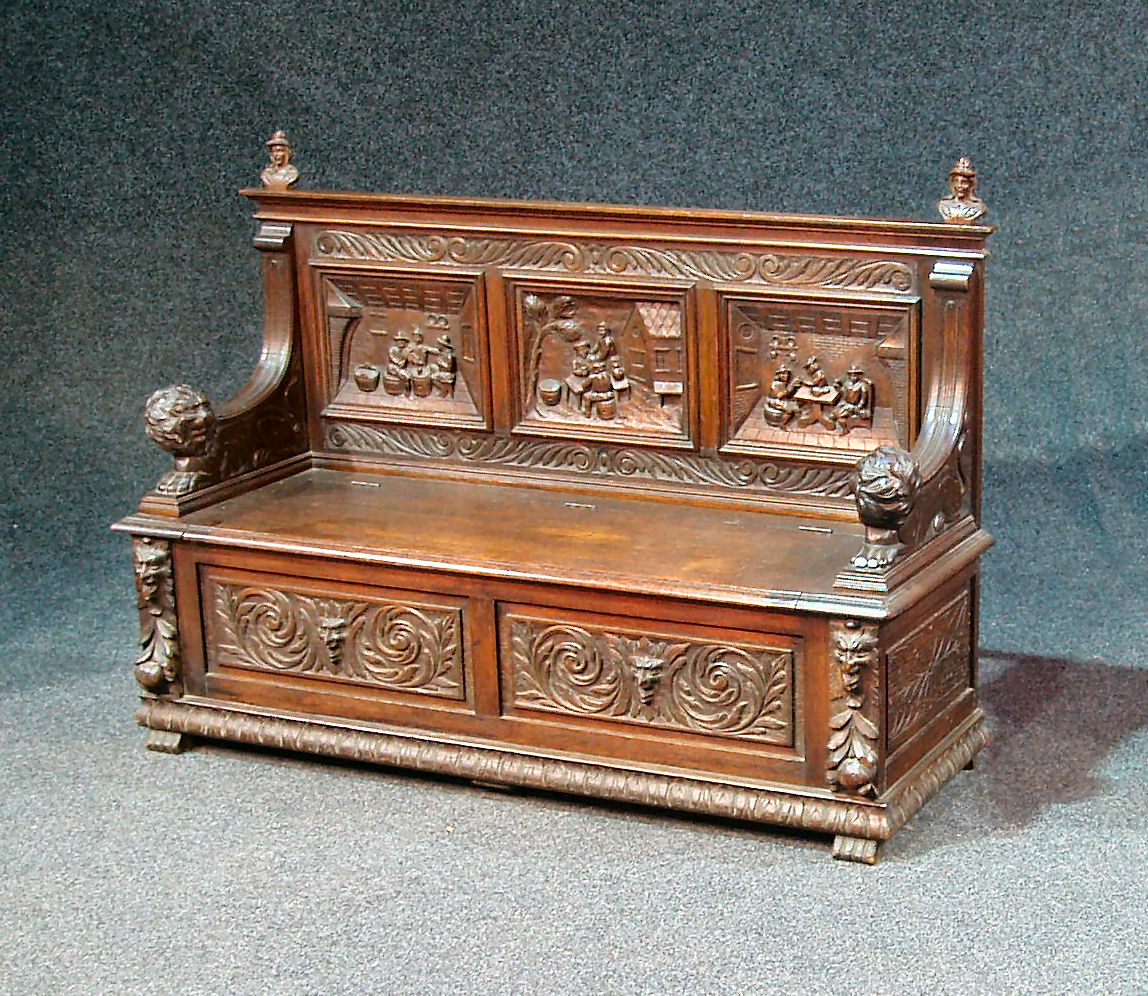 A 17th century style oak monk's bench,