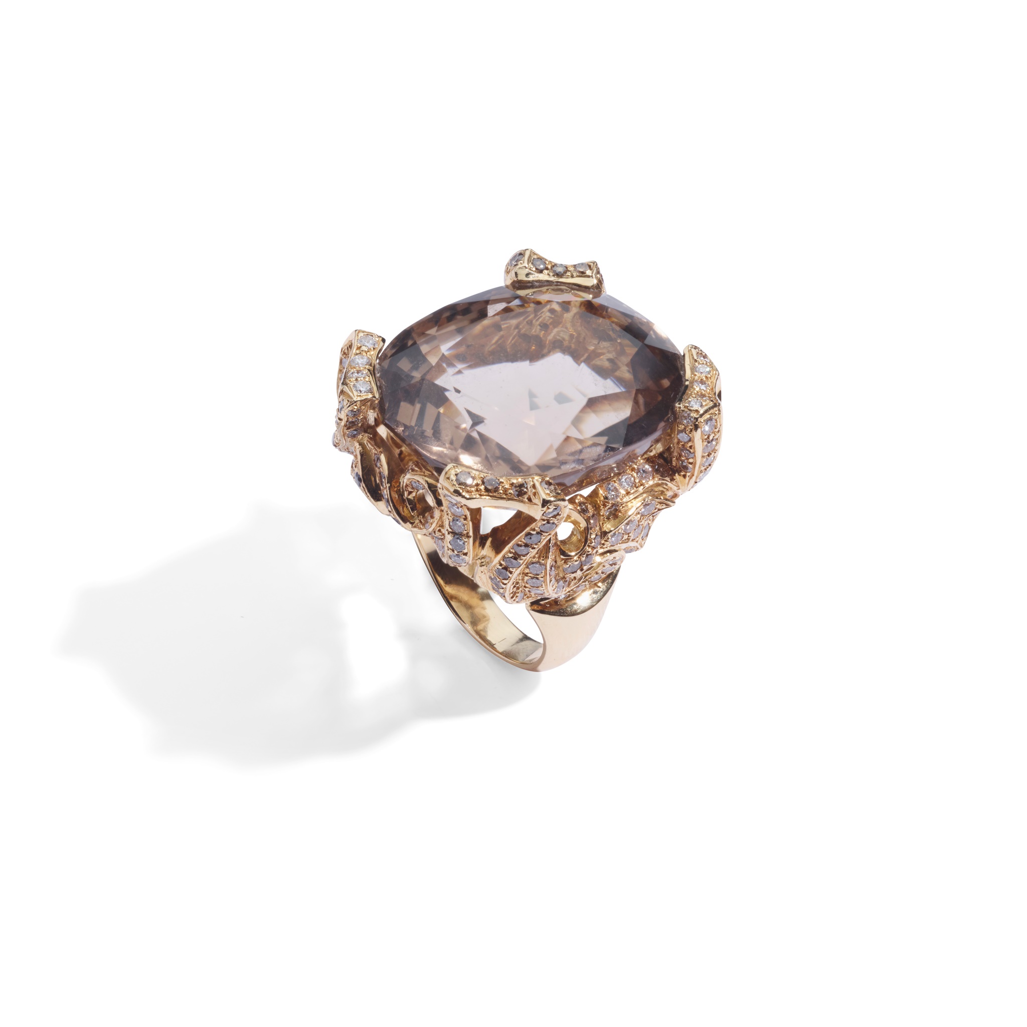 A smoky quartz and diamond dress ring