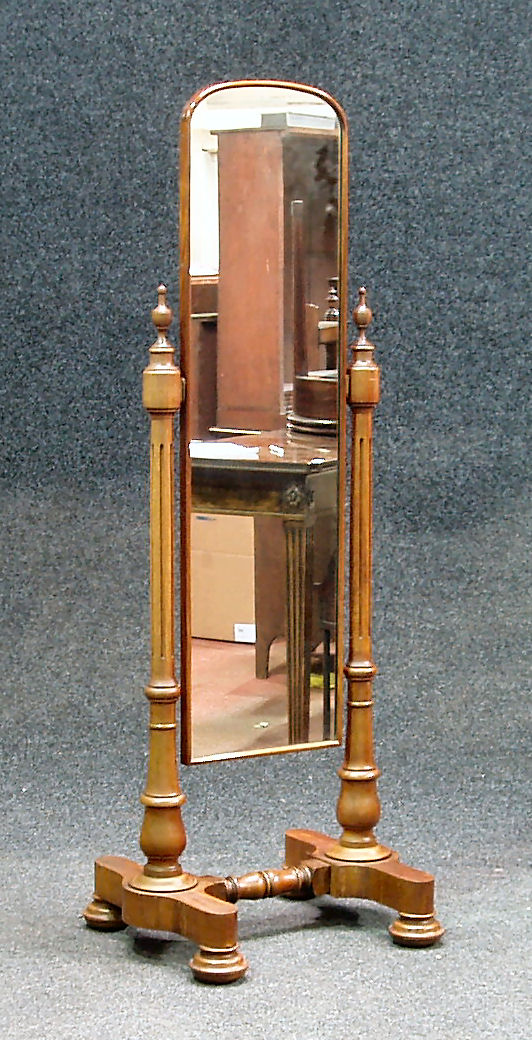An Edwardian mahogany cheval mirror