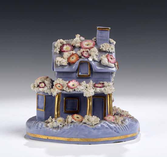 A mid-19h century Staffordshire lavender ground pastille burner,