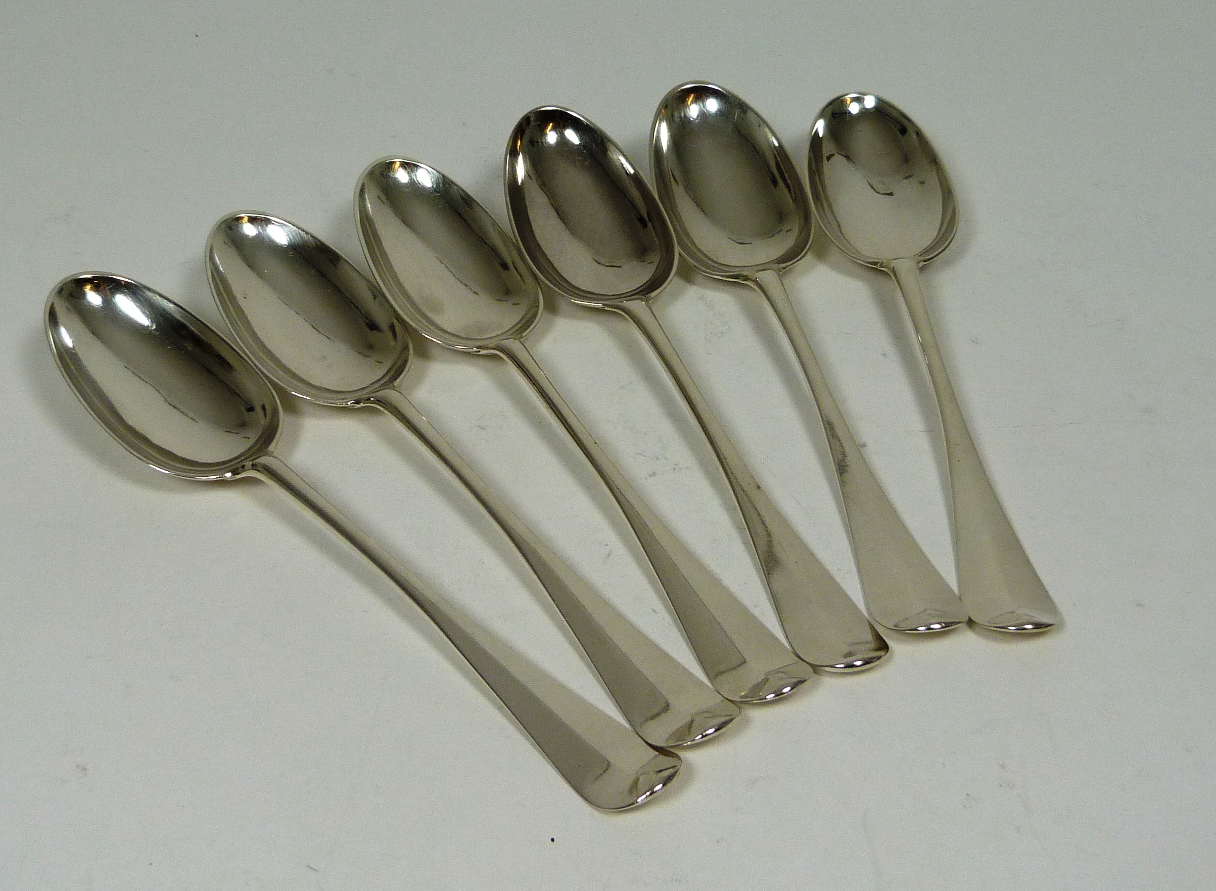 A matched set of George III tablespoons