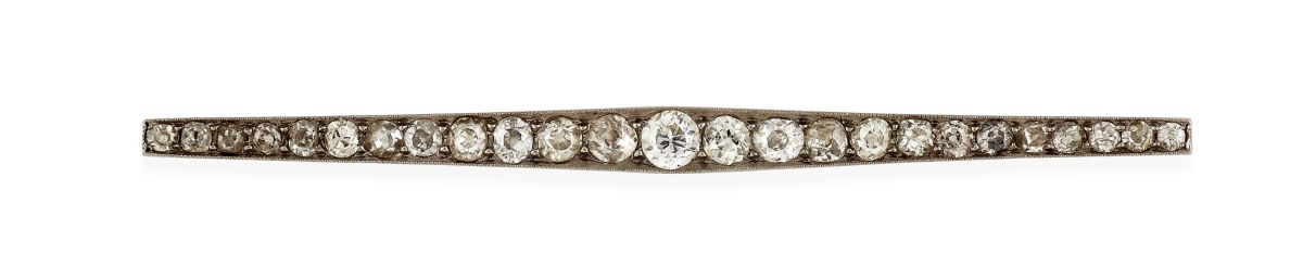 A diamond set bar brooch