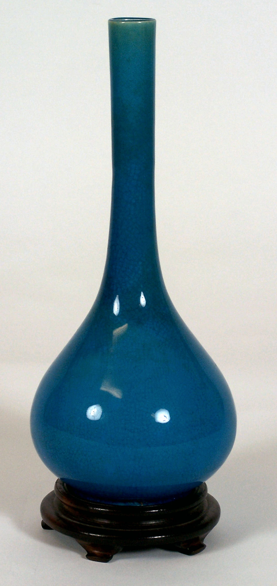 An 18th century Chinese crackle glazed monochrome turquoise bottle vase