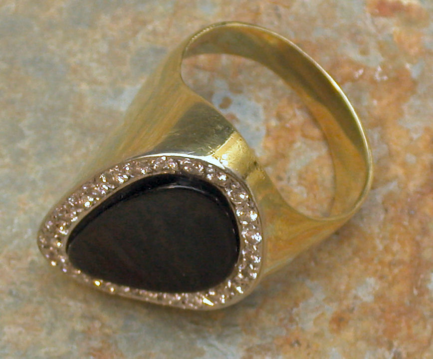 An onyx and diamond cocktail ring,