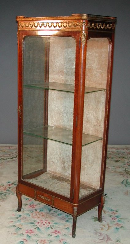 A pair of walnut framed tub armchairs