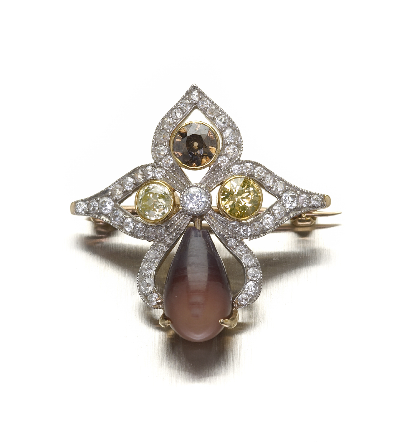 A fancy diamond and conch pearl set brooch