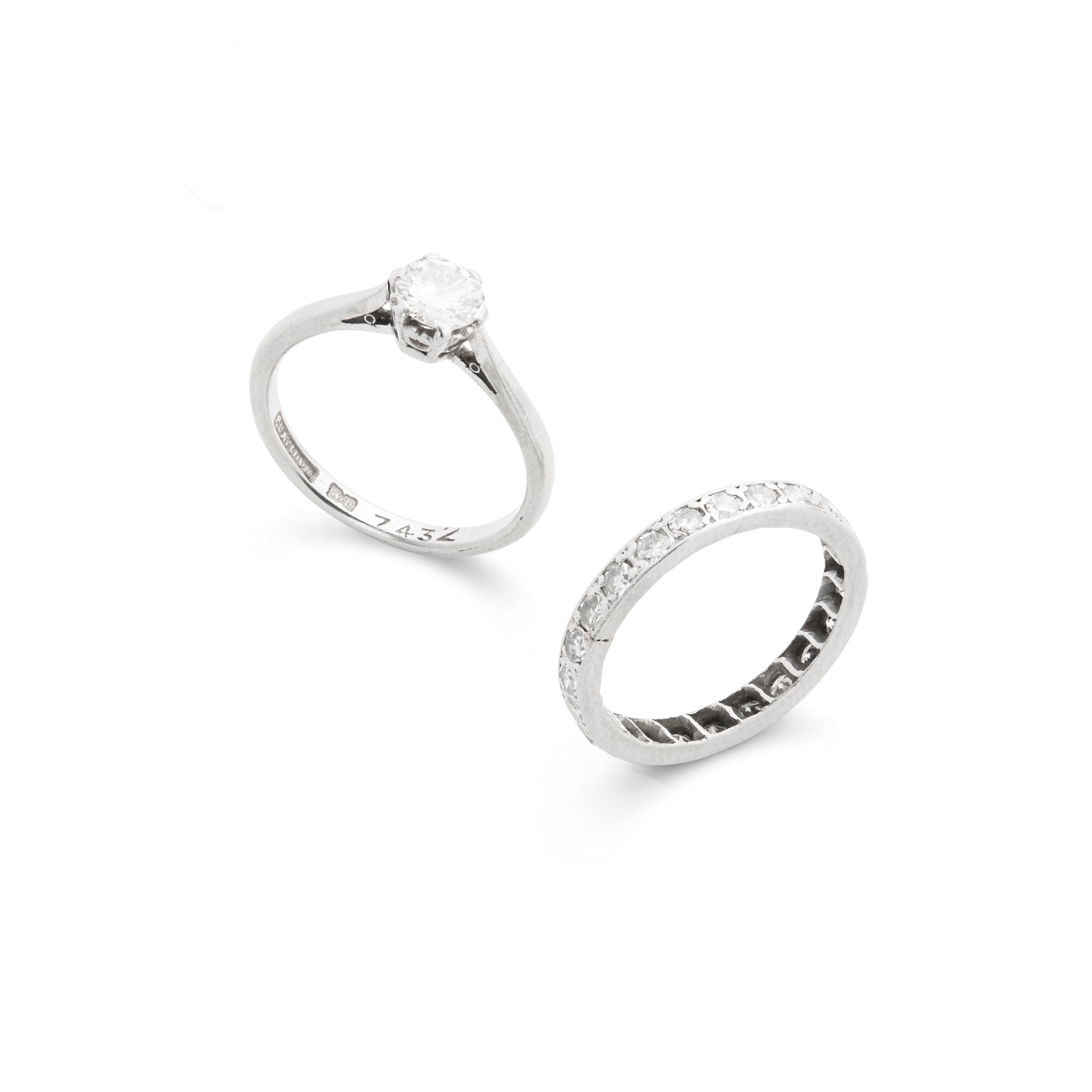 A diamond single-stone ring and eternity ring